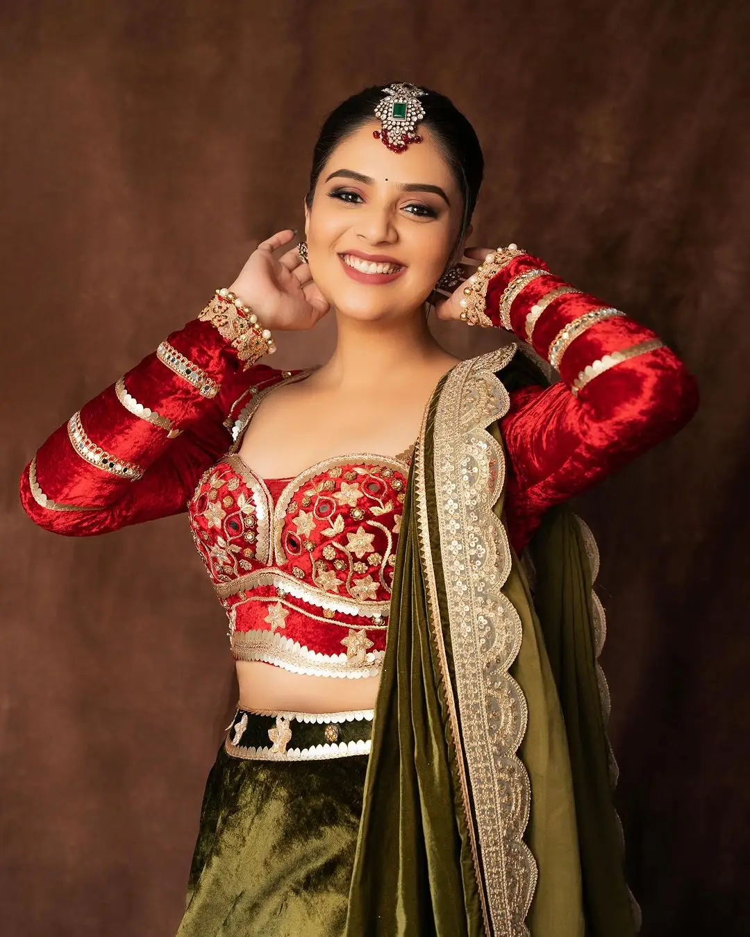 Indian TV Actress Sreemukhi in Traditional Green Lehenga Red Choli